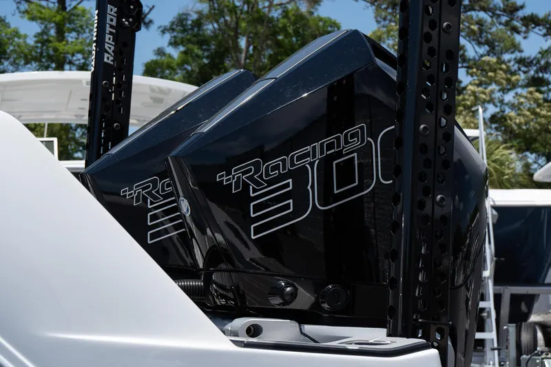  Yacht Photos Pics 2023 Sunsation 32 CCX boat with dual Racing 300 engines, showcasing sleek design and power.