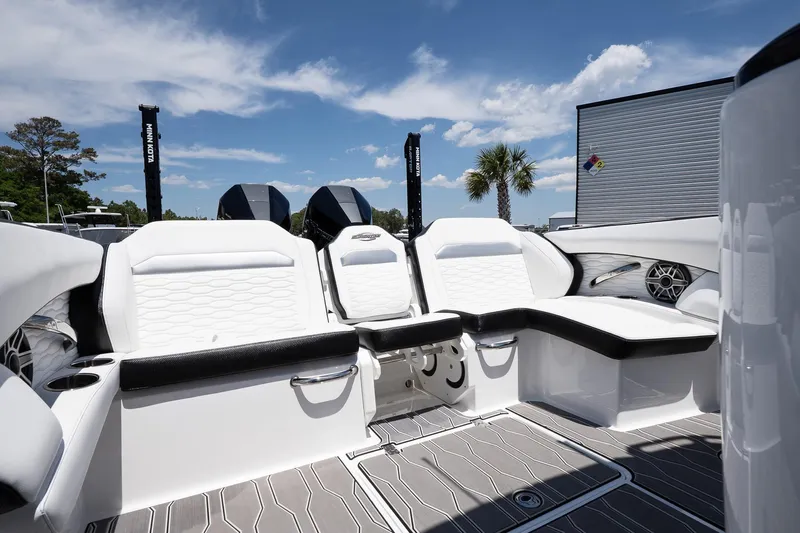  Yacht Photos Pics 2023 Sunsation 32 CCX boat interior with white seating and modern design.
