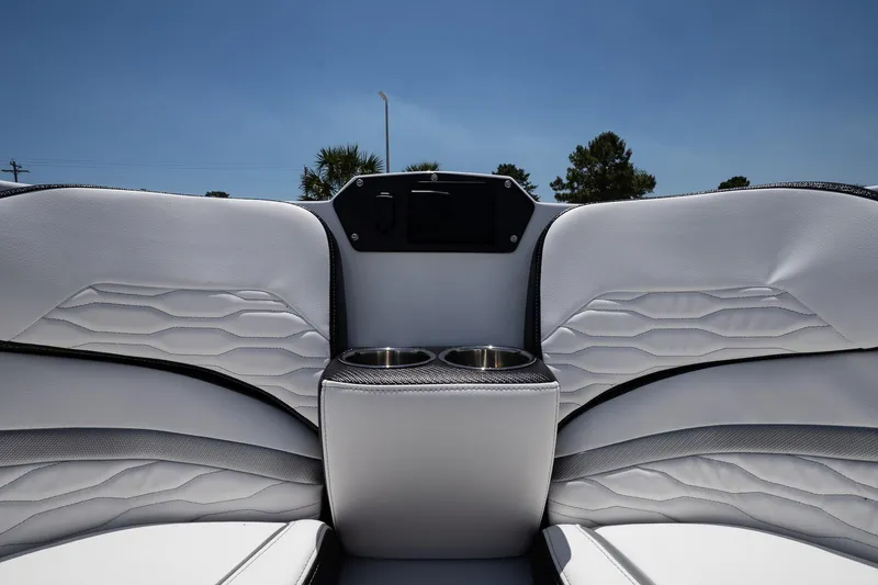  Yacht Photos Pics 2023 Sunsation 32 CCX boat interior with white seating and cup holders.