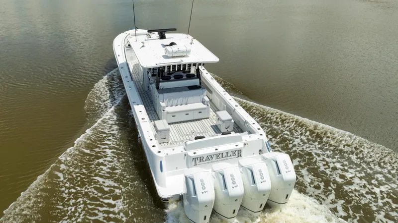 Traveller Yacht Photos Pics 2021 HCB Suenos boat cruising on water, featuring four powerful engines.