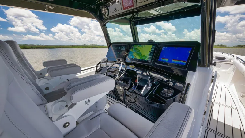 Traveller Yacht Photos Pics 2021 HCB Suenos boat cockpit with advanced navigation displays and luxurious seating.