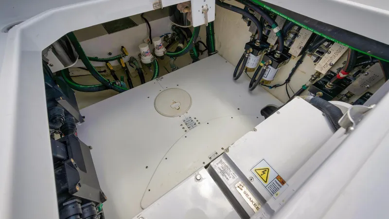 Traveller Yacht Photos Pics Engine compartment of 2021 HCB Suenos boat, showcasing mechanical components and wiring.