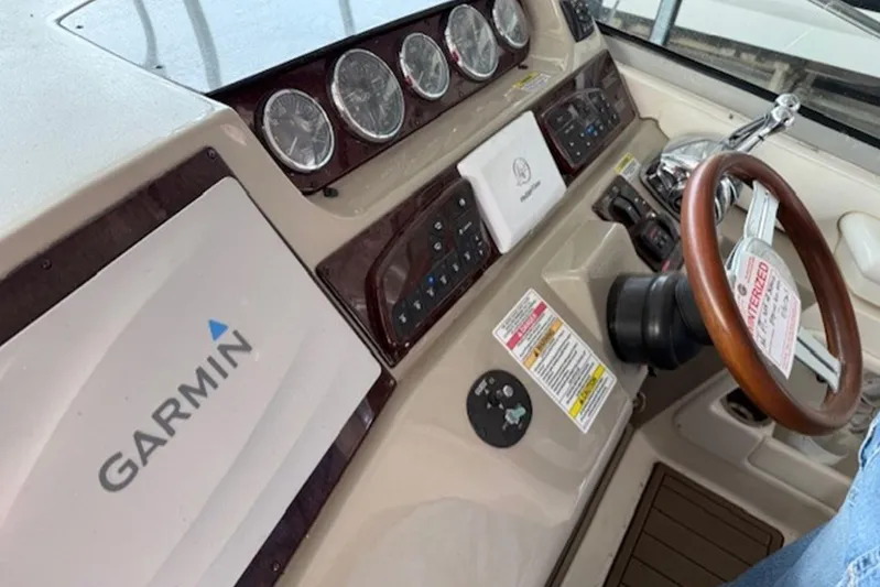  Yacht Photos Pics Control panel of a 2011 Sea Ray Sundancer 370 with Garmin navigation system.