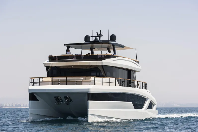 Lazzara Lpc 300 Yacht Photos Pics Luxurious 2027 Lazzara LPC 300 yacht cruising on open water.