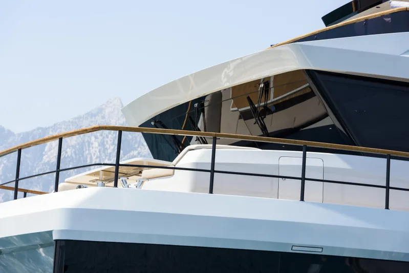 Lazzara Lpc 300 Yacht Photos Pics Luxury yacht Lazzara LPC 300, 2027 model, with sleek design and mountain backdrop.