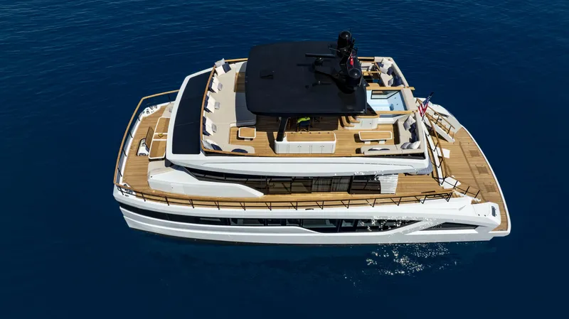 Lazzara Lpc 300 Yacht Photos Pics Luxurious 2027 Lazzara LPC 300 yacht cruising on serene blue waters.