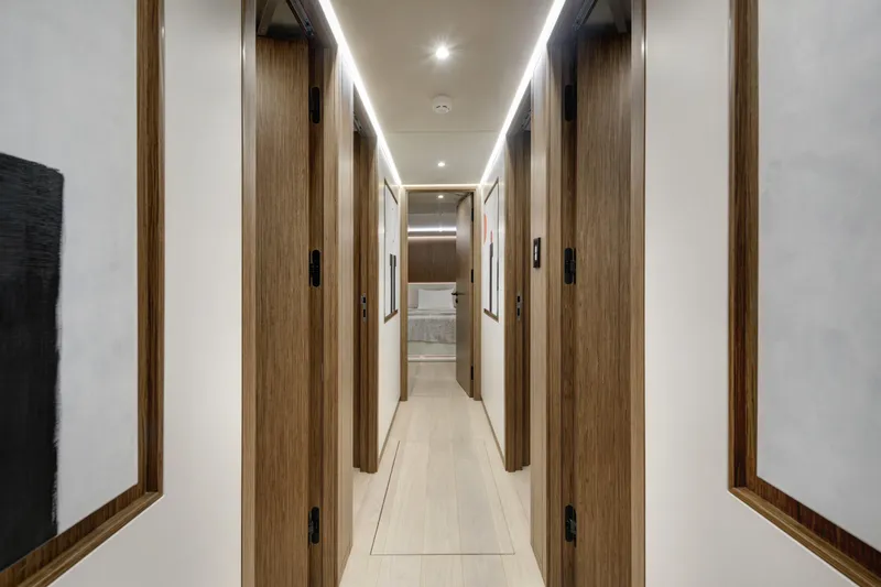 Lazzara Lpc 300 Yacht Photos Pics Luxurious interior hallway of 2027 Lazzara LPC 300 yacht, featuring modern wood accents.