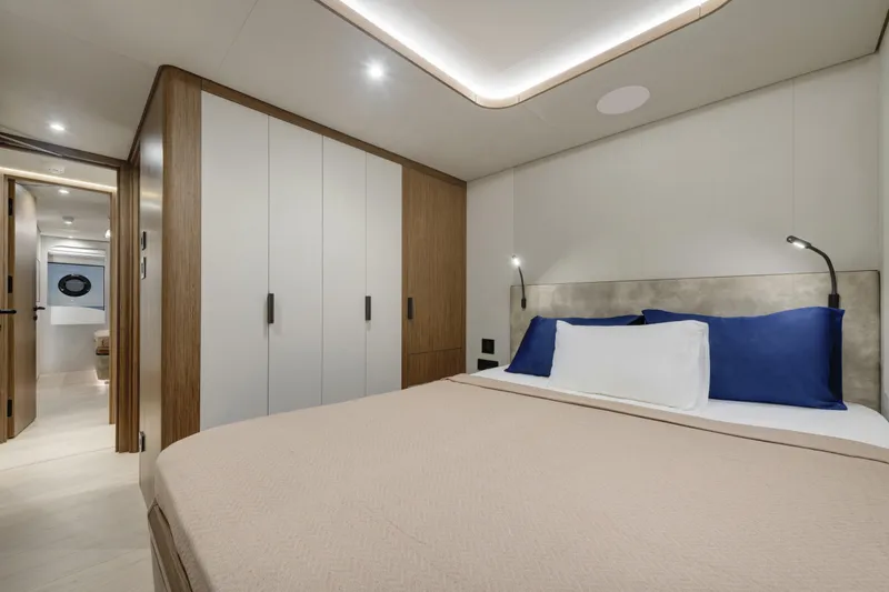 Lazzara Lpc 300 Yacht Photos Pics Luxurious bedroom interior of 2027 Lazzara LPC 300 yacht with modern design.