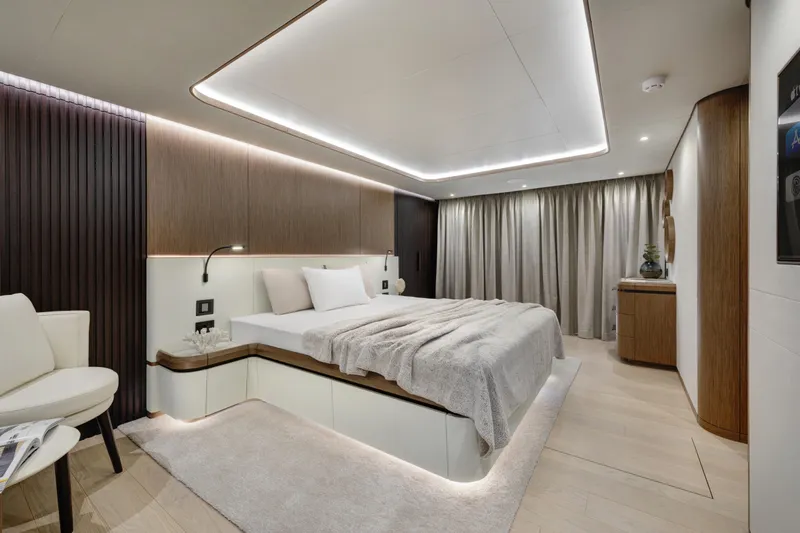 Lazzara Lpc 300 Yacht Photos Pics Luxurious 2027 Lazzara LPC 300 yacht bedroom with modern design and ambient lighting.
