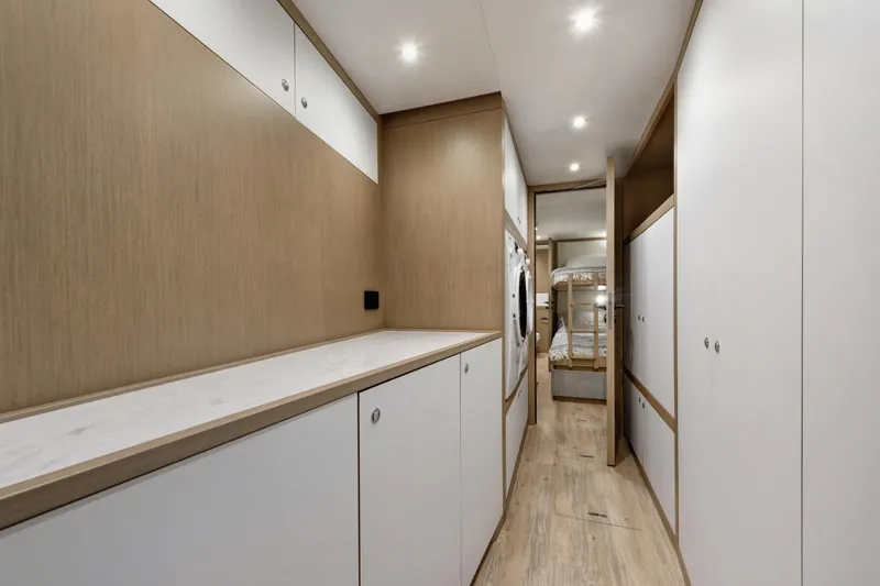 Lazzara Lpc 300 Yacht Photos Pics Modern interior of 2027 Lazzara LPC 300 yacht with sleek cabinetry and ambient lighting.