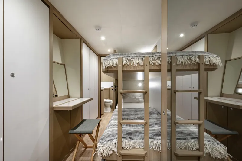 Lazzara Lpc 300 Yacht Photos Pics Modern Lazzara LPC 300 yacht cabin interior with bunk beds and sleek design, 2027 model.