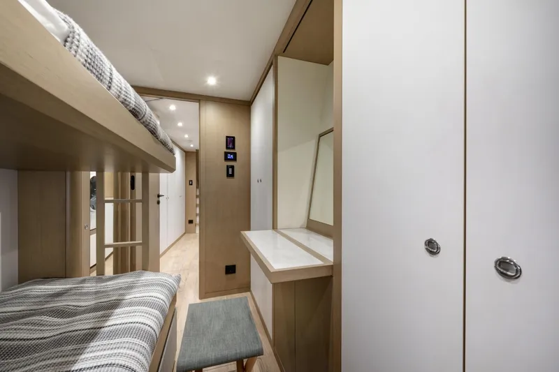 Lazzara Lpc 300 Yacht Photos Pics Interior of 2027 Lazzara LPC 300 yacht with bunk beds and modern design.