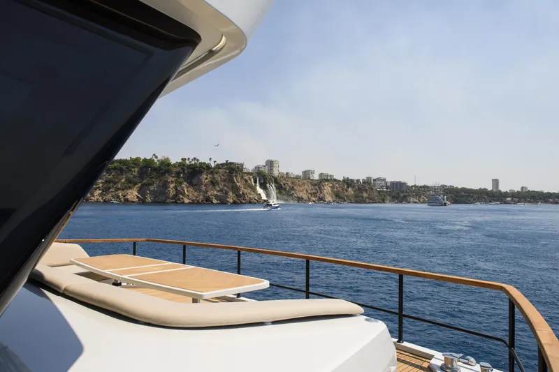 Lazzara Lpc 300 Yacht Photos Pics Luxury Lazzara LPC 300 yacht cruising near scenic coastline, 2027 model.