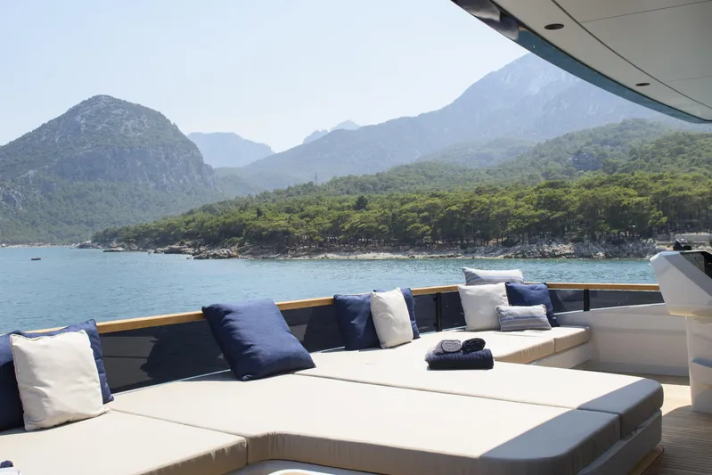 Lazzara Lpc 300 Yacht Photos Pics Luxurious Lazzara LPC 300 yacht deck with scenic mountain and sea view, 2027 model.