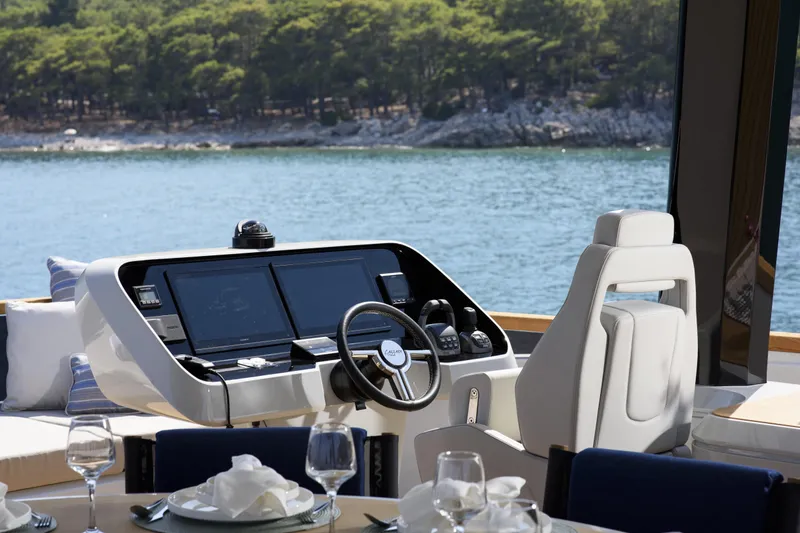 Lazzara Lpc 300 Yacht Photos Pics Luxury Lazzara LPC 300 yacht helm with scenic ocean view, 2027 model.