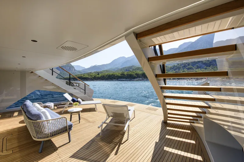 Lazzara Lpc 300 Yacht Photos Pics Luxurious 2027 Lazzara LPC 300 yacht deck with scenic ocean and mountain views.