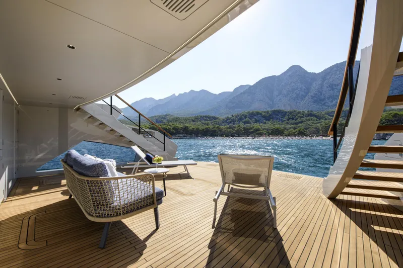 Lazzara Lpc 300 Yacht Photos Pics Luxurious 2027 Lazzara LPC 300 yacht deck with scenic ocean and mountain views.