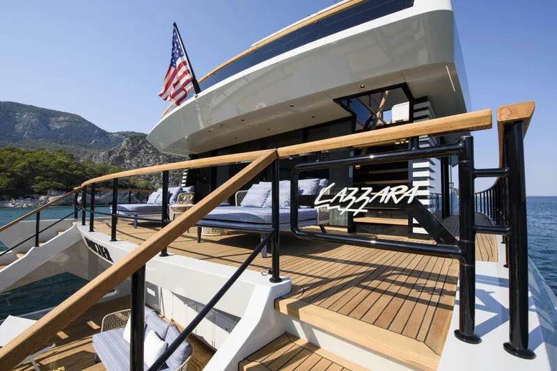 Lazzara Lpc 300 Yacht Photos Pics Luxury Lazzara LPC 300 yacht, 2027 model, docked with scenic mountain backdrop.