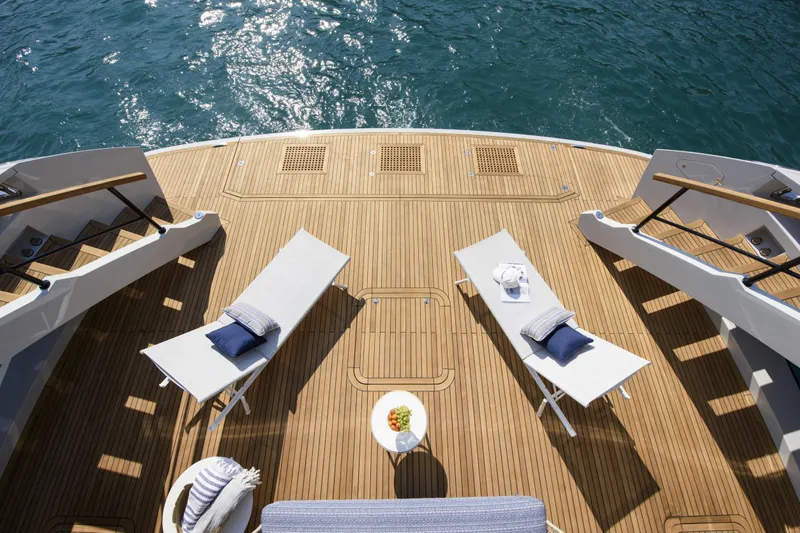 Lazzara Lpc 300 Yacht Photos Pics Luxurious deck of 2027 Lazzara LPC 300 yacht with sun loungers and ocean view.