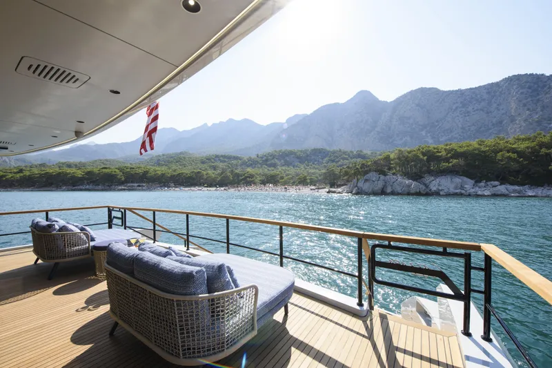 Lazzara Lpc 300 Yacht Photos Pics Luxurious Lazzara LPC 300 yacht deck with scenic mountain and ocean view, 2027 model.