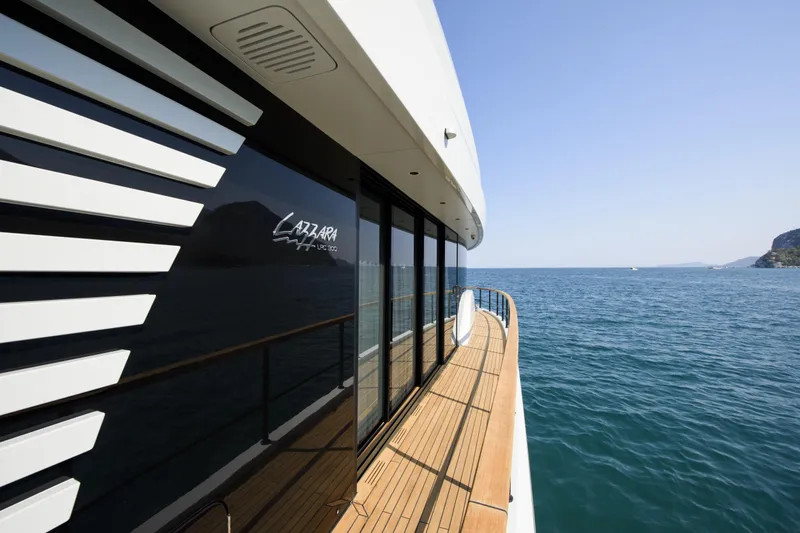 Lazzara Lpc 300 Yacht Photos Pics Luxury yacht Lazzara LPC 300, 2027 model, cruising on serene ocean waters.