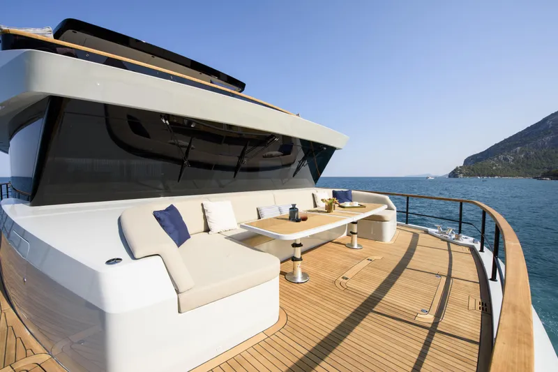 Lazzara Lpc 300 Yacht Photos Pics Luxurious 2027 Lazzara LPC 300 yacht deck with seating and ocean view.