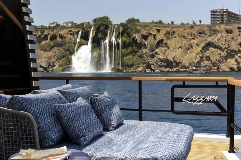 Lazzara Lpc 300 Yacht Photos Pics Luxurious Lazzara LPC 300 yacht with scenic waterfall view, 2027 model.