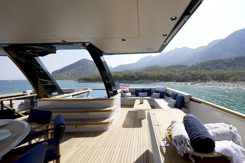 Lazzara Lpc 300 Yacht Photos Pics Luxurious Lazzara LPC 300 yacht deck with scenic ocean and mountain views, 2027 model.