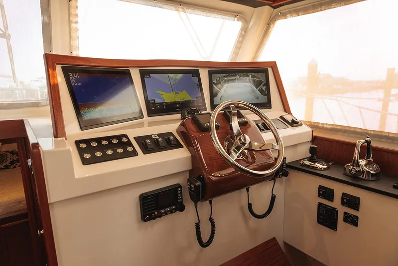  Yacht Photos Pics Helm of 2022 Composite Yacht CY46 with navigation screens and controls.