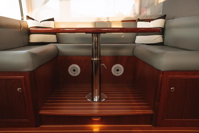  Yacht Photos Pics Luxurious interior of 2022 Composite Yacht CY46 with elegant wood and leather seating.