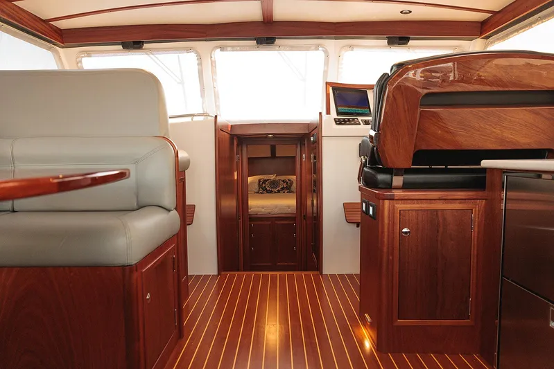  Yacht Photos Pics Luxurious interior of 2022 Composite Yacht CY46 with elegant wood finishes and modern seating.