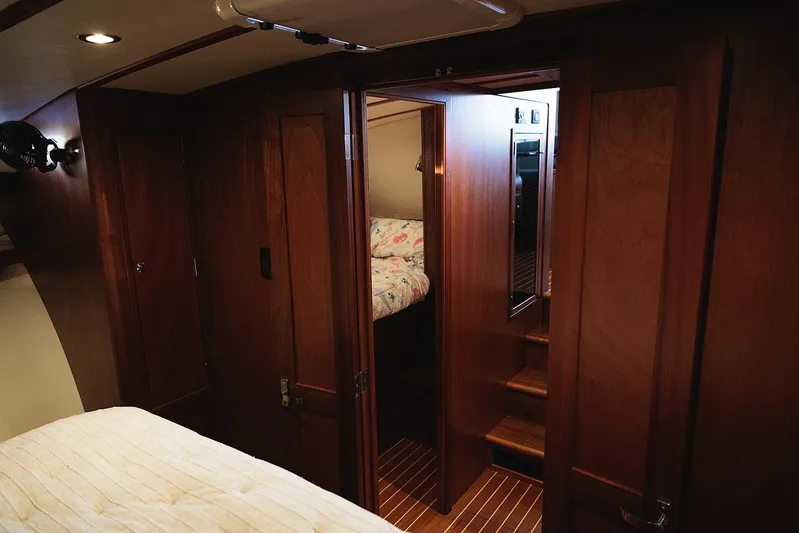  Yacht Photos Pics Interior of 2022 Composite Yacht CY46, featuring wooden paneling and cozy cabin space.