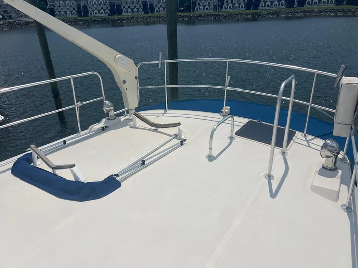  Yacht Photos Pics Deck of 1998 Cherubini Independence yacht with railing and water view.