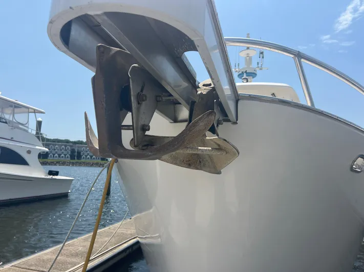  Yacht Photos Pics Cherubini Independence 1998 boat with anchor, docked in sunny marina.