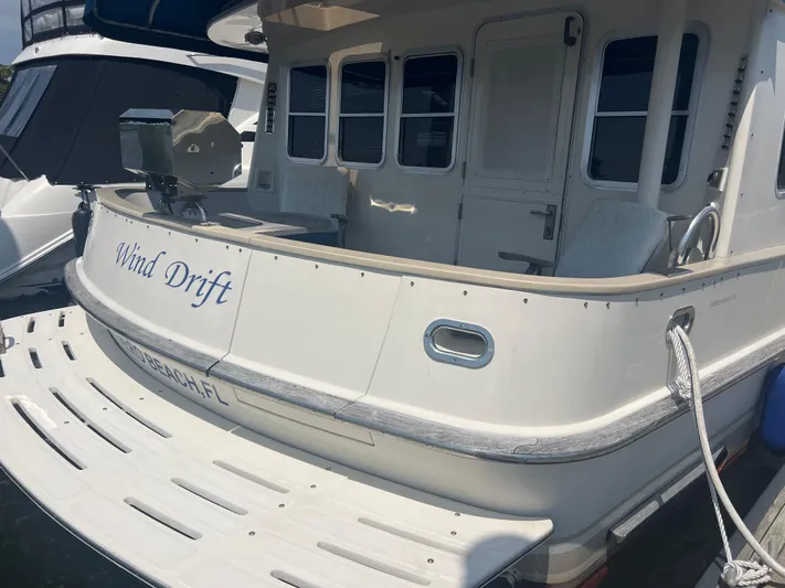  Yacht Photos Pics 1998 Cherubini Independence yacht named "Wind Drift" docked at a marina.