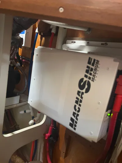  Yacht Photos Pics Electrical system inside a 1998 Cherubini Independence boat, featuring a Magnum Energy inverter.
