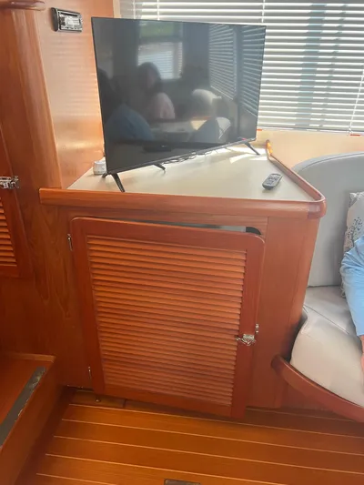  Yacht Photos Pics TV on wooden cabinet in 1998 Cherubini Independence boat interior.