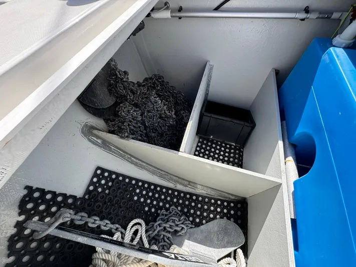 Bluevana Yacht Photos Pics Anchor and chain storage in 2023 Lagoon 42 sailboat compartment.