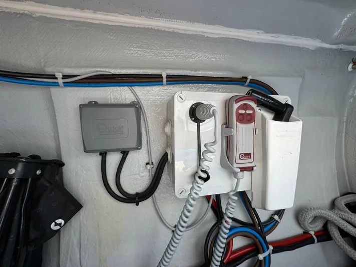 Bluevana Yacht Photos Pics Electrical panel on a 2023 Lagoon 42 yacht with wiring and controls.