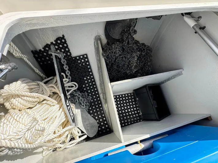 Bluevana Yacht Photos Pics Storage compartment of 2023 Lagoon 42 with ropes, anchor, and chains.