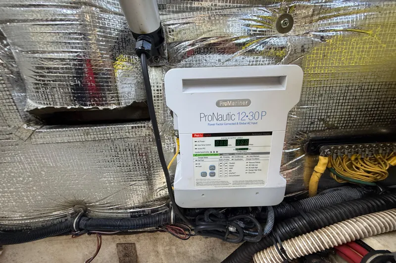  Yacht Photos Pics ProNautic 12:30P charger in 2018 Chris-Craft Capri 27 boat engine compartment.