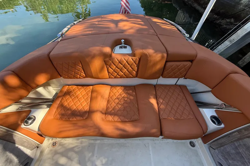  Yacht Photos Pics Luxurious seating on 2018 Chris-Craft Capri 27 boat with quilted leather upholstery.