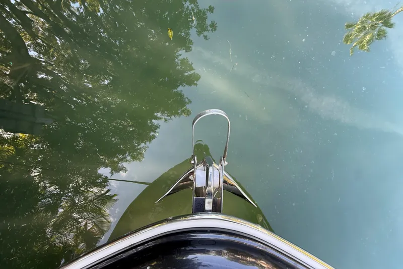  Yacht Photos Pics 2018 Chris-Craft Capri 27 boat bow reflecting on calm water.