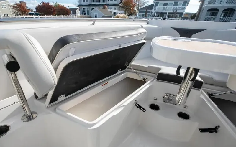  Yacht Photos Pics 2022 Sailfish 290 CC boat interior with storage compartments and seating.