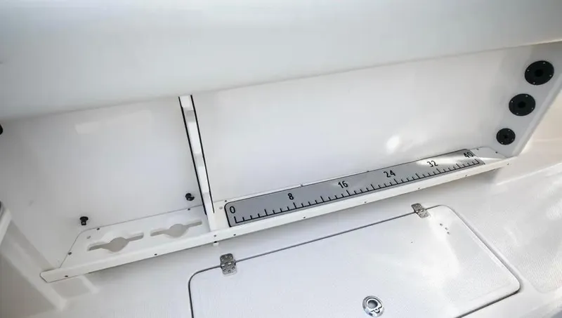  Yacht Photos Pics Sailfish 290 CC 2022 boat interior with built-in measuring ruler.