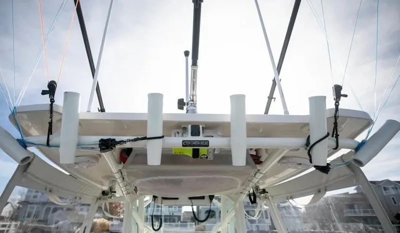  Yacht Photos Pics Sailfish 290 CC 2022 boat with fishing rod holders and equipment.