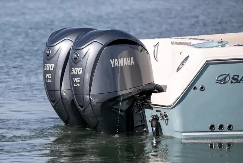  Yacht Photos Pics 2022 Sailfish 290 CC with twin Yamaha 300 V6 outboard engines on water.
