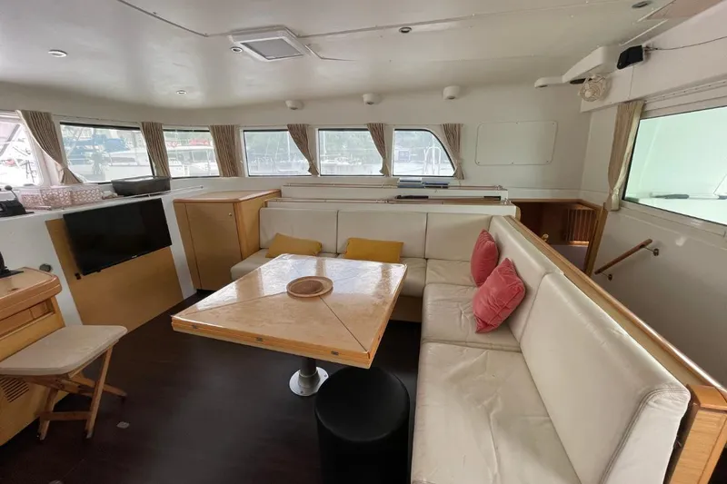 Tikiaora Yacht Photos Pics Interior of 2008 Lagoon 500 yacht with cozy seating and modern decor.