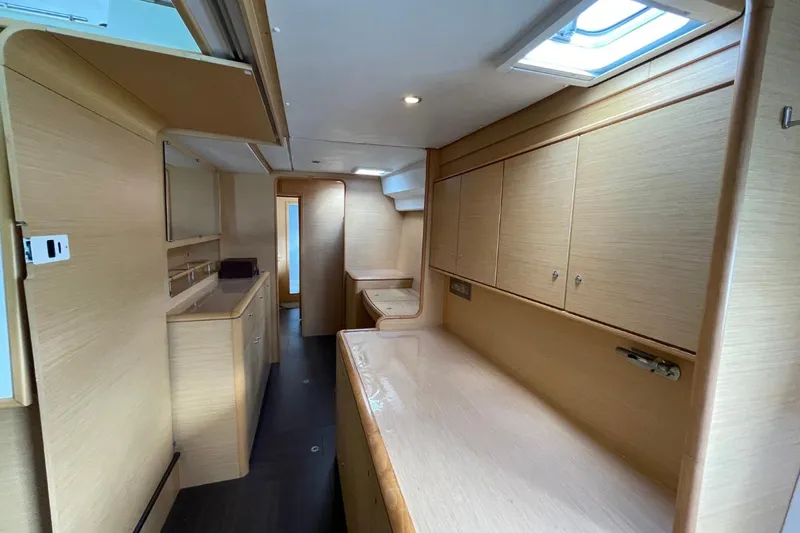 Tikiaora Yacht Photos Pics Interior of 2008 Lagoon 500 yacht with light wood cabinetry and modern design.