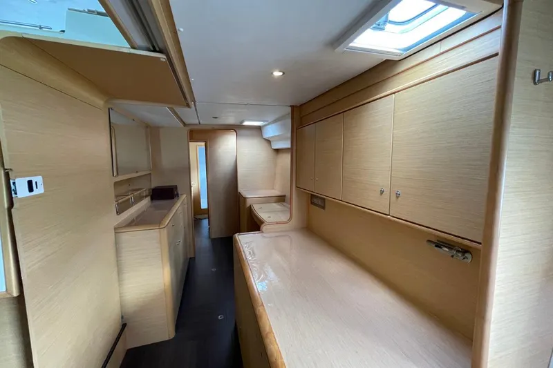 Tikiaora Yacht Photos Pics Interior of 2008 Lagoon 500 yacht with light wood cabinetry and modern design.